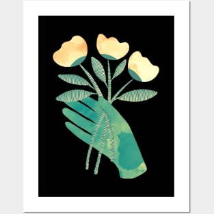 Green hand with yellow flowers for you on black background Posters and Art